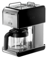 Waking up on the bright side is easy with a bold, iconic morning maker! Crafted from durable die-cast aluminum, this coffee pro lights up your kitchen with great style and incredible taste. An integrated cup warmer gets your mug ready to go, while the easy-to-use one-touch controls and professional heating system whip up enticing coffee at the perfect temp! Model DCM04. Waking up on the bright side is easy with a bold, iconic morning maker! Crafted from durable die-cast aluminum, this coffee pro lights up your kitchen with great style and incredible taste. An integrated cup warmer gets your mug ready to go, while the easy-to-use one-touch controls and professional heating system whip up enticing coffee at the perfect temp! Model DCM04.