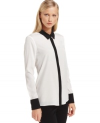 Contrasting trim gives this sleek, classic shirt silhouette a contemporary touch. By Calvin Klein.