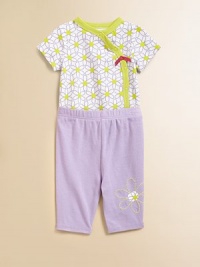 Crafted in plush cotton, this vibrant two-piece set is especially charming with pretty flower prints and embroidery.CrewneckShort sleevesFront snapsBottom snapsElastic waistbandCottonMachine washImported Please note: Number of snaps may vary depending on size ordered. 