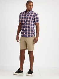Bold checks cover this short-sleeve woven shirt of pure cotton with a signature logo on the front patch pocket. Button-down frontEmbroidered logo on chestCottonMachine washImported Bold checks cover this short-sleeve woven shirt of pure cotton with a signature logo on the front patch pocket. Button-down frontEmbroidered logo on chestCottonMachine washImported