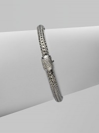 Diamond clasp accents sterling silver and 18K white gold chain bracelet. Pavé diamond, 0.17 tcw Push button close 7½ long Hand made in Bali Diamond clasp accents sterling silver and 18K white gold chain bracelet. Pavé diamond, 0.17 tcw Push button close 7½ long Hand made in Bali
