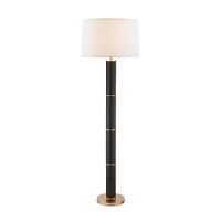 Leather wrapped shaft with natural brass accents makes for a fabulous floor lamp. Leather wrapped shaft with natural brass accents makes for a fabulous floor lamp.