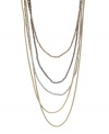 Beautiful beadwork. Five rows of chic beaded strands make a striking statement on this Kenneth Cole necklace. Set in silver tone, gold tone and bronze tone mixed metal. Approximate length: 27 inches + 3-inch extender.