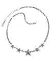 Shine brighter than the rest in GUESS's chic 5-star collar necklace. Crafted in silver tone mixed metal with pave glass accents adorning each star. Approximate length: 16 inches + 2-inch extender.