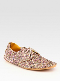 Easy silhouette of glitter-coated canvas for a notice-me look. Glitter-coated canvas upperRubber solePadded insoleMade in ItalyOUR FIT MODEL RECOMMENDS ordering ½ size down as this style runs large. Easy silhouette of glitter-coated canvas for a notice-me look. Glitter-coated canvas upperRubber solePadded insoleMade in ItalyOUR FIT MODEL RECOMMENDS ordering ½ size down as this style runs large.