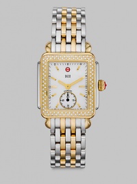 From the Deco Collection. A stunning, high contrast timepiece with a dazzling diamond bezel. Quartz movementWater resistant to 5 ATMRectangular goldtone stainless steel case, 29mm (1.1) X 31mm (1.2)Diamond accented bezel, .49 tcwMother-of-pearl dialBar hour markersSecond hand sub-dialTwo-tone stainless steel link bracelet, 16mm (0.6)Imported From the Deco Collection. A stunning, high contrast timepiece with a dazzling diamond bezel. Quartz movementWater resistant to 5 ATMRectangular goldtone stainless steel case, 29mm (1.1) X 31mm (1.2)Diamond accented bezel, .49 tcwMother-of-pearl dialBar hour markersSecond hand sub-dialTwo-tone stainless steel link bracelet, 16mm (0.6)Imported