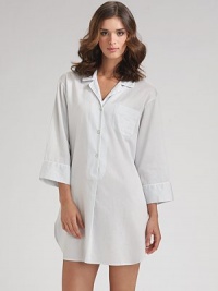 A loose-fitting, relaxed style with a traditional notch collar and full-length sleeves. Pullover style Partial button-front placket Front patch pocket About 36 from shoulder to hem Cotton; machine wash Imported A loose-fitting, relaxed style with a traditional notch collar and full-length sleeves. Pullover style Partial button-front placket Front patch pocket About 36 from shoulder to hem Cotton; machine wash Imported