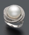 Revel in the sweet glamour of the 1950s. This breathtaking ring features a vintage-inspired design highlighting a cultured South Sea pearl (13-1/2 mm) in 14k white gold surrounded by layers of sparkling round-cut diamonds (1 ct. t.w.).