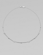 From the Silver Rain Collection. Delicate diamonds and faceted clear quartz are equally radiant within setttings of hammered sterling silver on a graceful chain.Diamonds, .20 tcw Clear quartzSterling silverLength, about 18Lobster claspImported