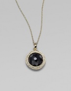 From the Lollipop Collection. A faceted black onyx, framed in diamonds, hanging on a graceful chain. Black onyx Diamonds, 0.14 tcw 18k yellow gold Chain length, about 16 with 2 extender Pendant diameter, about ½ Lobster clasp Imported