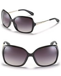 Glam it up in MARC BY MARC JACOBS oversized sunglasses with metal temples and signature logo detail. Glam it up in MARC BY MARC JACOBS oversized sunglasses with metal temples and signature logo detail.