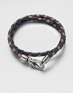 A richly-hued braided leather bracelet perfect for layering and wrap around styling.LeatherAbout 3 diam.Spring claspMade in Italy