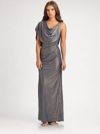 An elegant, dramatic asymmetrical drape defines this sparkling silhouette.Cowl necklineShoulder drapeBeaded detailSide tucksConcealed back zipFully linedAbout 48 from natural waistPolyester/spandexDry cleanImportedModel shown is 5'10 (177cm) wearing US size 4. An elegant, dramatic asymmetrical drape defines this sparkling silhouette.Cowl necklineShoulder drapeBeaded detailSide tucksConcealed back zipFully linedAbout 48 from natural waistPolyester/spandexDry cleanImportedModel shown is 5'10 (177cm) wearing US size 4.