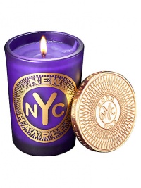 From a uniquely New York collection of scents, this intoxicating scented candle celebrates the legendary history of Harlem.  · Blend of lavender, cedarwood, coffee, vanilla, patchouli  · Made of the finest wax and wicks  · In sturdy, tinted glass container  · Gilt metal cap keeps scent from fading 