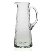 Entirely handmade and based on an antique original, this beautiful pitcher makes a bold and contemporary statement by itself or as part of the entire barware set.