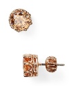 Rock a heavy metal: this pair of simple Juicy Couture stud earrings styles every outfit edgy, cast in rose gold plate.
