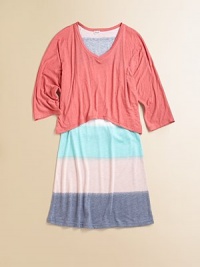 It looks like a tee with a skirt but this easy, pretty style is actually one piece with a loose solid bodice attached to a slightly flared, widely striped skirt.V necklineThree-quarter sleevesTop has loose, contour hemSlight A-line shapePullover styling50% rayon/50% polyesterMachine washImported It looks like a tee with a skirt but this easy, pretty style is actually one piece with a loose solid bodice attached to a slightly flared, widely striped skirt.V necklineThree-quarter sleevesTop has loose, contour hemSlight A-line shapePullover styling50% rayon/50% polyesterMachine washImported