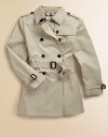 This chic double-breasted silhouette features traditional trench styling and a checked cotton lining.Point collarButton epaulettesButton-down gunflapDouble-breasted button frontLong sleeves with belted cuffsSelf beltRainflapBack ventCottonCotton liningMachine washImported