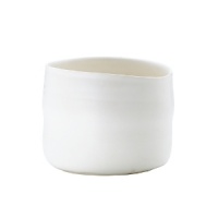 The unique shape and design of this low vase demonstrates a natural elegance, marrying form and function for a pure, organic expression. The unique shape and design of this low vase demonstrates a natural elegance, marrying form and function for a pure, organic expression.