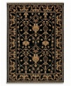 Graceful gold-beige designs add magnetic appeal to this deep-black area rug. Karastan's signature luster-wash gives the piece an exceptionally soft hand, while also enhancing the richness of the colors. Woven from plush New Zealand wool. Cotton foundation.