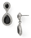 Work pared down elegance into your look with these Carolee earrings. They feature bold jet stone drops, which come set in striking silver plate.