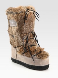 Thin laces top this ultra-soft cold weather staple of lush rabbit fur and leather. Rubber heel, 2 (50mm)Shaft, 11½Leg circumference, 17¼Rabbit fur and leather upperPull-on styleFleece liningRubber solePadded insoleMade in Italy Thin laces top this ultra-soft cold weather staple of lush rabbit fur and leather. Rubber heel, 2 (50mm)Shaft, 11½Leg circumference, 17¼Rabbit fur and leather upperPull-on styleFleece liningRubber solePadded insoleMade in Italy