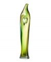 Slender and softly radiant, this tall green vase is a stand-out presence in any room. Part of the Artist's Choice collection by Sweden's oldest glassworks, Kosta Boda, this dreamy, whimsical collection is crafted by hand so no two are exactly alike. Designed by Kjell Engman.
