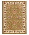 Bring the brilliance of ancient Persian textile design home with the green and ivory Lyndhurst area rug from Safavieh. Crafted from soft polypropylene, this rug radiates timeless allure with the added convenience of easy-care construction. (Clearance)