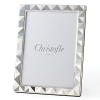 This modern Christofle Pyramide frame is etched in a pyramid pattern from gleaming silver plate.