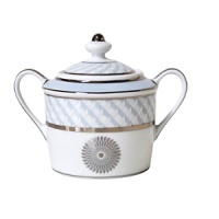 Carefully rendered in a style reminiscent of neoclassic trompe l'oeil-a French term for artwork that depicts optical illusions-a captivating geometric rosette motif traverses this elegant porcelain sugar bowl from Bernardaud. Delicate shades of ice blue, mother-of-pearl and gray are enhanced by fine platinum details. Carefully rendered in a style reminiscent of neoclassic trompe l'oeil-a French term for artwork that depicts optical illusions-a captivating geometric rosette motif traverses this elegant porcelain sugar bowl from Bernardaud. Delicate shades of ice blue, mother-of-pearl and gray are enhanced by fine platinum details.