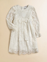 Nothing's lovelier for your young lady than the airy swirls of this lavish lace frock with a flowing skirt and a scalloped hem.Round necklineLong sleeves with ruffled cuffsEmpire waist with bowBack button closeSilk/cotton liningRayon/cotton/nylon/silkDry cleanImported Please note: Number of buttons may vary depending on size ordered. Nothing's lovelier for your young lady than the airy swirls of this lavish lace frock with a flowing skirt and a scalloped hem.Round necklineLong sleeves with ruffled cuffsEmpire waist with bowBack button closeSilk/cotton liningRayon/cotton/nylon/silkDry cleanImported Please note: Number of buttons may vary depending on size ordered.