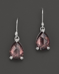Pear-shaped raspberry crystal is set in sterling silver on these classic Judith Ripka earrings. Pear-shaped raspberry crystal is set in sterling silver on these classic Judith Ripka earrings.