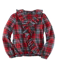 The classic plaid top is accented with sweet ruffles and a smocked waist for girlish flair. The classic plaid top is accented with sweet ruffles and a smocked waist for girlish flair.
