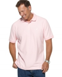 A classic polo from Nautica crafted in soft Pima cotton. With allover basic colors and an embroidered logo at chest, it's a go-to shirt you'll want in every color. A classic polo from Nautica crafted in soft Pima cotton. With allover basic colors and an embroidered logo at chest, it's a go-to shirt you'll want in every color.
