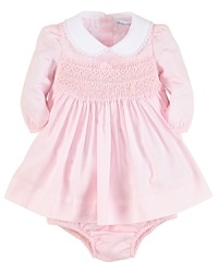 Pretty meets preppy with a soft cotton twill dress styled with embroidery, smocking and lace trim. Pretty meets preppy with a soft cotton twill dress styled with embroidery, smocking and lace trim.