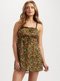 Flirtatious flowers cover this silky-smooth design, topped off with a ruffled neckline. Square neckline with solid trim and ruffled edgesAdjustable spaghetti strapsFront tieAbout 33 from shoulder to hemPolyesterMachine washImported Flirtatious flowers cover this silky-smooth design, topped off with a ruffled neckline. Square neckline with solid trim and ruffled edgesAdjustable spaghetti strapsFront tieAbout 33 from shoulder to hemPolyesterMachine washImported