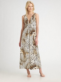 Exotic leopard-print falls to the floor in this beguiling v-neck design.Wide shoulder straps Gathered bodice Empire waist About 52 from shoulder to hem Polyester; machine wash Imported Exotic leopard-print falls to the floor in this beguiling v-neck design.Wide shoulder straps Gathered bodice Empire waist About 52 from shoulder to hem Polyester; machine wash Imported