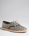 Loeffler Randall takes the espadrille flat to new places with oxford detailing and tribal-influenced woven uppers.