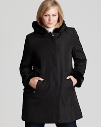 Plush faux fur lining lends supple warmth to this hooded A-line coat by Marc New York. Plush faux fur lining lends supple warmth to this hooded A-line coat by Marc New York.