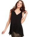 Fringe trim adds texture and movement to this RACHEL Rachel Roy tank for chic soiree style!