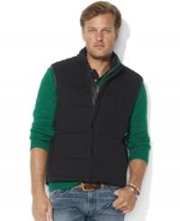 Dress to impress in an iconic quilted vest, accented with leather binding at the armholes and Ralph Lauren's embroidered Big Pony in a tonal shade at the left chest. Dress to impress in an iconic quilted vest, accented with leather binding at the armholes and Ralph Lauren's embroidered Big Pony in a tonal shade at the left chest.