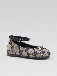 GG print fabric with horsebit detail, leather trim, and ankle strap. Hypoallergenic palladium finished horsebit hardware Slip-on flats with buckle ankle strap Rubber sole Made in Italy