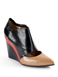 THE LOOKContrast point toeCutout vampConcealed elastic goring on the sidePadded insoleNotched back colorblock wedge, 4 (100mm)THE MATERIALColorblock leather upperLeather lining and soleORIGINMade in Italy