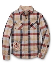 An updated take on classic plaid, this casual GUESS Kids button-down features a front logo and an edgy-cool zip pocket. An updated take on classic plaid, this casual GUESS Kids button-down features a front logo and an edgy-cool zip pocket.