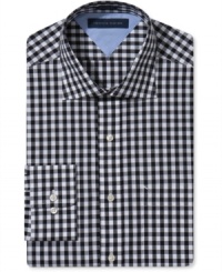 Classic gingham on this slim-fit Tommy Hilfiger dress shirt adds a punch of pattern to your everyday business look. Classic gingham on this slim-fit Tommy Hilfiger dress shirt adds a punch of pattern to your everyday business look.