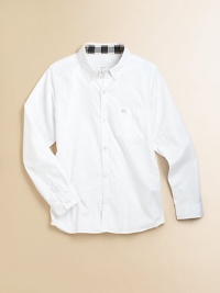 A wardrobe staple in crisp cotton with a check collar lining and embroidered Burberry logo.Button-down collarLong sleeves with button cuffsButton-frontPatch pocketCottonMachine washImported Please note: Number of buttons may vary depending on size ordered. A wardrobe staple in crisp cotton with a check collar lining and embroidered Burberry logo.Button-down collarLong sleeves with button cuffsButton-frontPatch pocketCottonMachine washImported Please note: Number of buttons may vary depending on size ordered.