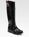 This rainy weather essential is dressed up with a signature metal medallion and a western-inflected harness. Rubber heel, 1 (25mm)Shaft, 15¼Leg circumference, 14½Rubber upperPull-on styleLeather liningRubber solePadded insoleImported