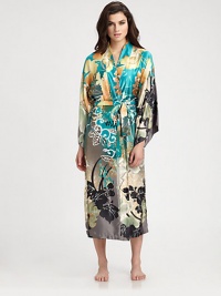 Luxurious silky-smooth fabric takes on a beautiful floral print in refreshing, tropical hues. V-neckDropped shouldersThree-quarter kimono sleevesSelf-tie waistAbout 49 from shoulder to hemPolyesterMachine washImported Luxurious silky-smooth fabric takes on a beautiful floral print in refreshing, tropical hues. V-neckDropped shouldersThree-quarter kimono sleevesSelf-tie waistAbout 49 from shoulder to hemPolyesterMachine washImported
