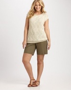 Cable-knit chic, slip into this stretch cotton top, which features a wavy pattern for an unforgettable look.V-necklineCap sleevesRibbed trimPull-on styleAbout 28 from shoulder to hem66% cotton/34% polyamideHand washImported of Italian fabric