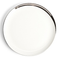 This oversized dinner plate glows with a hand-painted bright platinum design to create a contemporary classic on your table that will complement your dining experience throughout a lifetime of shifting trends and evolving fashions. This oversized dinner plate glows with a hand-painted bright platinum design to create a contemporary classic on your table that will complement your dining experience throughout a lifetime of shifting trends and evolving fashions.